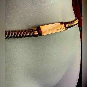Heavy weight Anne Klein gold colored stretch metal belt